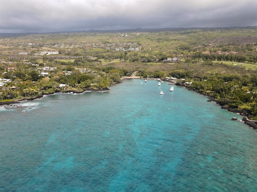 Aerial view of the bay at Kailua-Kona with boats at anchor and the town along the shore