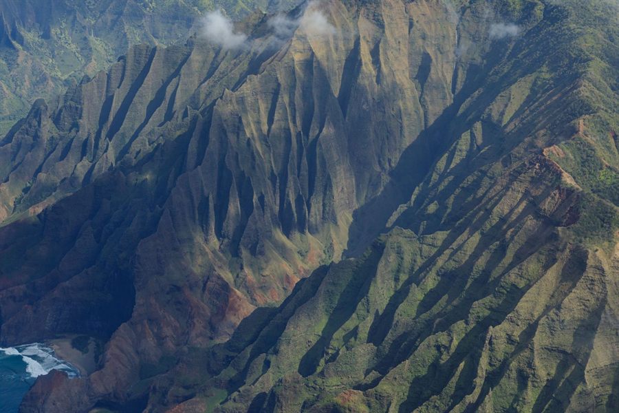 Fluted green ridges of the Na Pali Coast seen from the air on Kauai